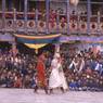 Milarepa and atsara, dance of Milarepa (Sha ba sha khyi 'cham), Paro Tshechu (tshes bcu), dance arena, Paro Tshechu (tshes bcu), 2nd day
