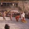 Milarepa, the hunter Gonpo Dorje, his servant Acho Pento and atsara, dance of Milarepa (Sha ba sha khyi 'cham), Paro Tshechu (tshes bcu), dance arena, Paro Tshechu (tshes bcu), 2nd day
