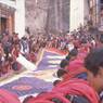 Thangka of Guru Rinpoche and his Eight manifestations, which brings liberation by sight (mthong grol) being brought down to be rolled, Paro Tshechu (tshe bcu), early morning 5th day
