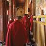 monks file into the Great Assembly Hall