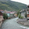 Houses along river in downtown Derge [sde dge].
