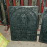 A wood block used to print images of Shakyamuni Buddha.