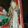 A statue of Yeshe Tsogyel to the right of Padmasambhava in Derge Monastery's Assembly Hall.