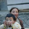 Young Tibetan girl and child.