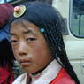 Young Tibetan girl with coral hair ornament.