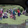 Tibetans relaxing on the hills near the monastery.