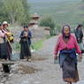 Tibetan women working along the road.