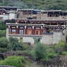 Tibetan houses made of stones and logs.