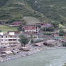 Tibetan houses along the ? River in Pelyul City.