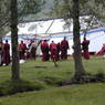 Tibetan monks setting up tents near Dargye Monastery.