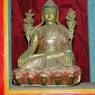 Small statue of Tibetan Lama [bla ma] kept in receptacle within wall.