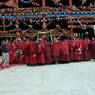 Tibetan monks watching a formal debtate of religious topics.