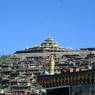 The Gyutrul Temple [sgyu 'phrul lha khang] and hillside of residences below.