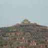 The Gyutrul Temple [sgyu 'phrul lha khang] with monastic personal residences below.