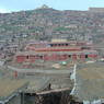 The new Assembly Hall for the Larung Gar Nunnery under construction beneath the Gyutrul Temple.