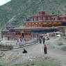 People entering the Assembly Hall of the Lay Religious Center at Larung Gar [bla rung gar].