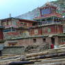 The side of the main Assembly Hall, with the fourth floor residence of Khenpo Jikme Phuntshok.