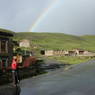 A rainbow over a house near the orphanage.