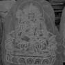 Close-up of a carving of the deity Vairocana in yabyum form.