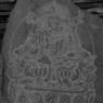 Close-up of a carving of the deity Vajrasattva in yabyum form.