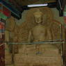 Clay statues of the Buddha under construction on the first floor of the temple.
