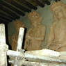Clay statues of the Buddha under construction on the first floor of the temple.