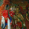 Various statues along the wall in the Tri Tsangkhang Chapel. ??