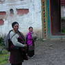A father and his daughter at the main entrance to the monastery.