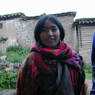 A young Tibetan woman visiting the monastery.