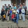 A tourist group in a courtyard on an upper level of the palace.