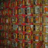 Shelves of traditional Tibetan texts inside the Assembly Hall.