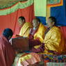 Three lamas (Abbot Dorji Tashi in the middle) on the ritual throne for the religious dances. ??