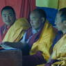 Three lamas (Abbot Dorji Tashi in the middle) on the ritual throne for the religious dances. ??