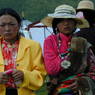 Dressed up young Tibetan women at the festival site.