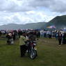 Crowds of people at the festival site.