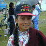 Close up of a 14 year old Tibetan girl wearing a baseball cap.