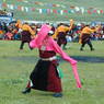 Older dancers performing on the field.