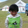 A shy young Tibetan girl.