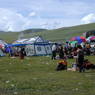People gathered at their picnic sites.