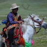 A Tibetan man on his horse.