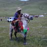 A Tibetan man on his horse.