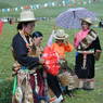 Three Tibetan women and a young boy.