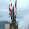 A cairn and prayer flags on top of one of the hills above Larung Gar.