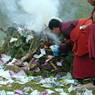 Monks burning juniper branches as offerings to local deities.