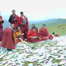 Monks reciting religious texts on top of one of the hills above Larung Gar.