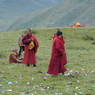 Monks near the cairn on top of one of the hills above Larung Gar.