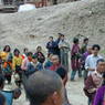 People following behind the car of Khenpo Jikme Phutsok, the founder of the Larung Gar religious community.