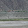 A view of the Yungdrung Ling, a monastery of the Bon religion, across the Tsangpo River.