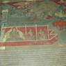 A scene depicting lay people and an animal on the walls of the inner circumambulation corridor.