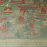 A close up of various figures in the mural on the walls of the inner circumambulation corridor.
